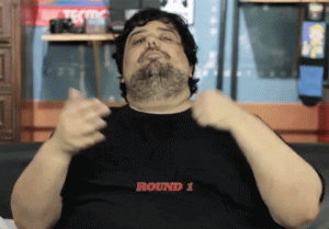 Gamer gif punching his palm with "round 1: fight" appearing at the bottom