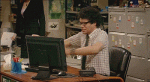 Gif of Moss from IT Crowd smashing computer