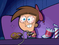 Timmy from Fairy Odd Parents playing video games on couch