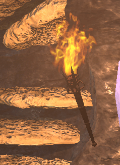 GIF showing a flickering fire torch in Unity, mounted on a cave wall